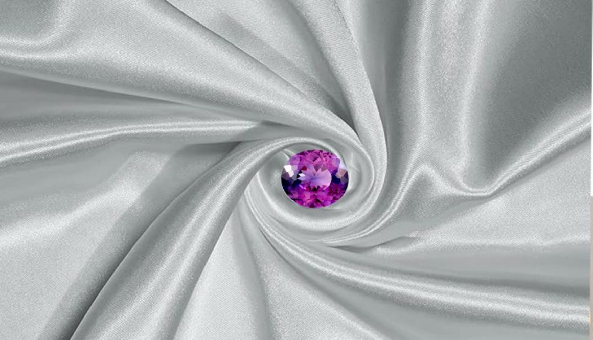 A rare and exquisite taaffeite gemstone displayed in a clean, neutral setting. The stone is faceted in a classic oval or cushion cut, revealing exceptional brilliance and clarity.